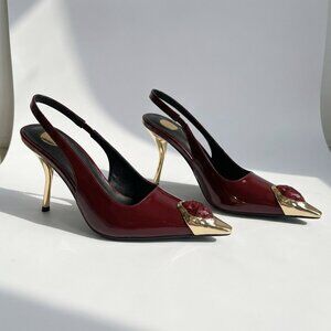 Patent leather slingback heels with gemstone tip embellishment